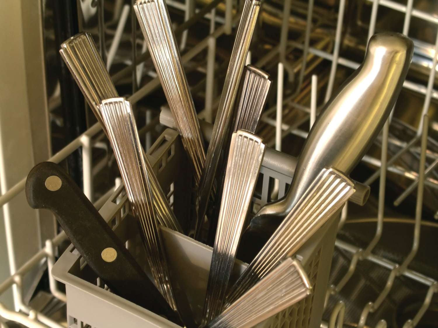 Do Utensils in the dishwasher go up or down?